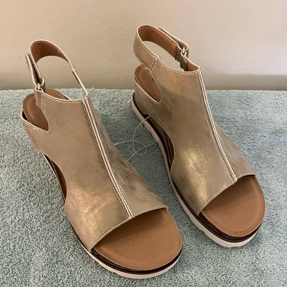 Misses new never worn gold color wedge heel summer sandals